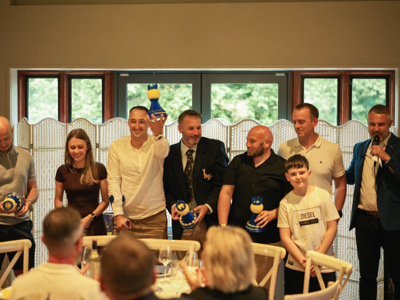 The awards ceremony and charity auction at the clubhouse, Hampton Court Palace Golf Club